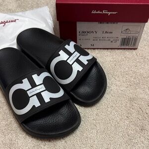 Salvatore Ferragamo Black Slides with White Accents